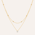Duet Luxe — Dupla Camada com Pendente Dourado